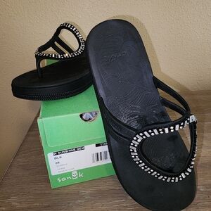 Black bedazzled Sanuk Sandals